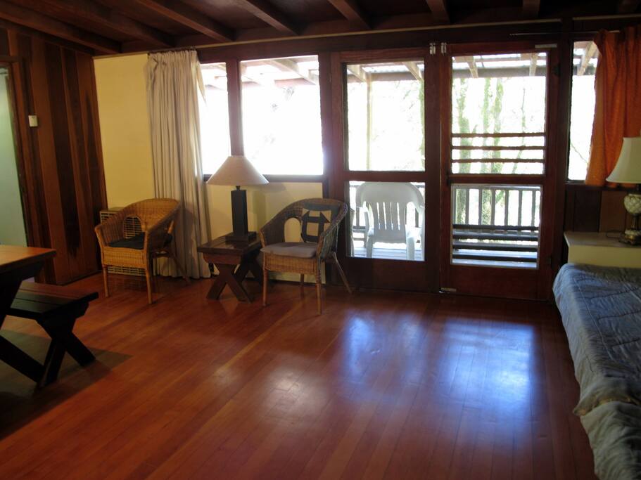 Our redwood cabins are clean and simple, with full kitchen, hardwood floors, and private bathroom.