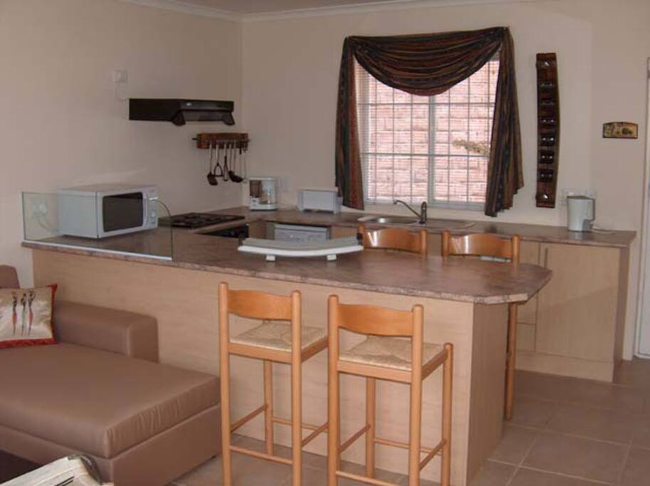 3 Sister's Cottage kitchen and living room.