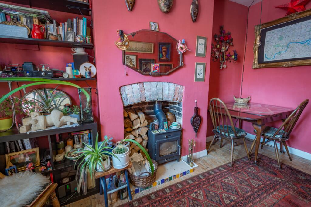 Dining table - you can pull it out and use a stool to seat 3 or 4 people