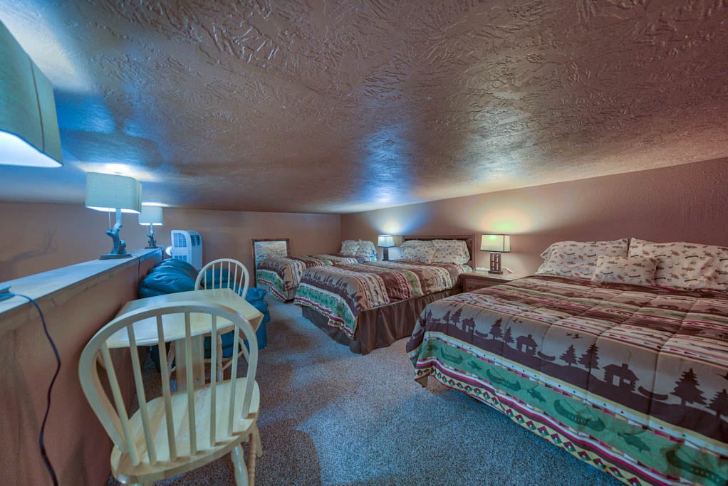 Bedroom 6 - Loft Area -Ceiling 5'2" (low ceiling) -three double beds