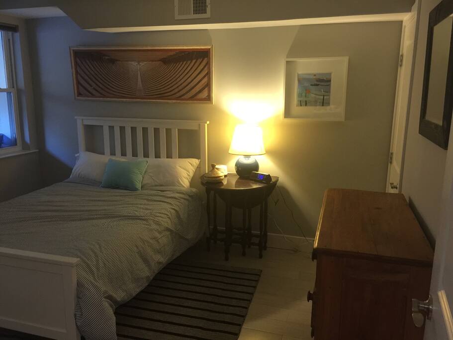amenities in bedroom include white noise machine and alarm block