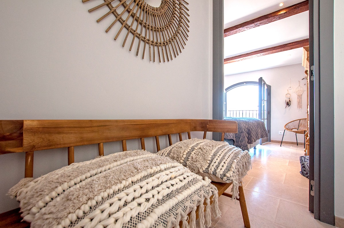 The hallway on the firts floor looking out at the left bedroom