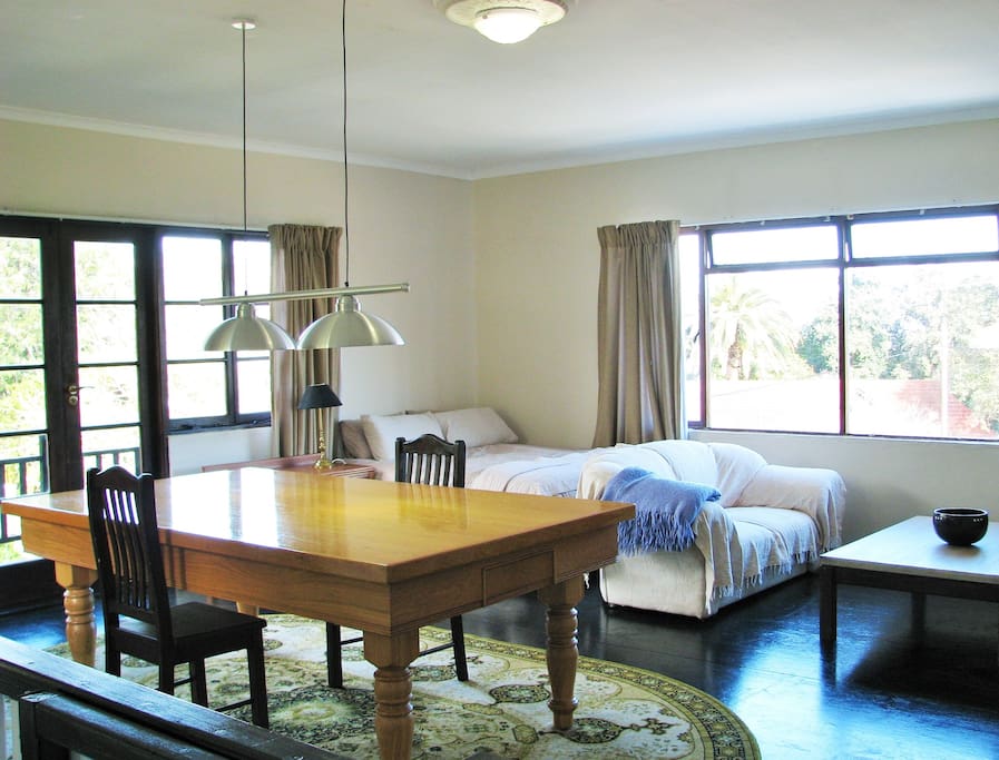 Double bed . Two seater couch and coffee table.