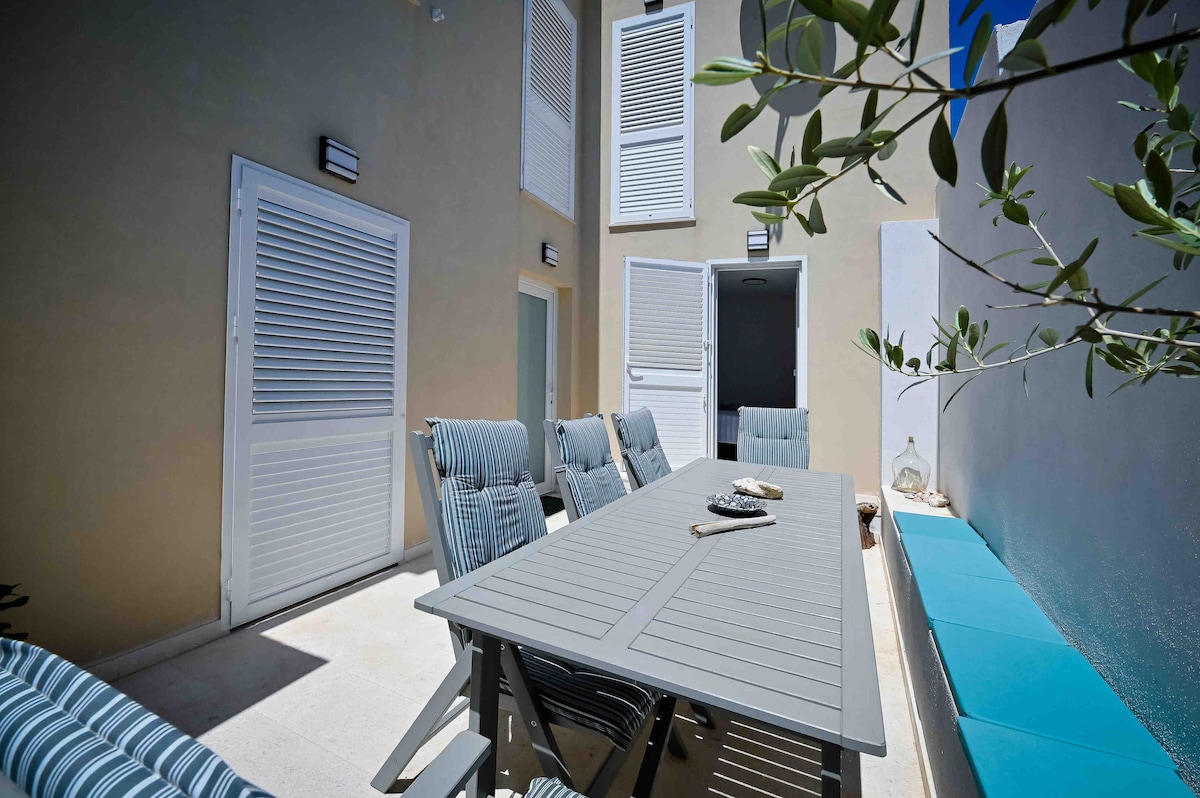 Backyard image 1 at Apartment Festini – Spacious apartment in central Pag in Pag