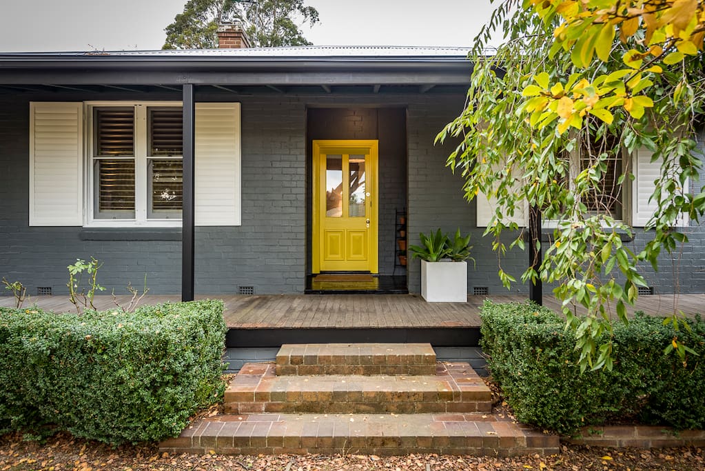 Welcoming Yellow front Door.