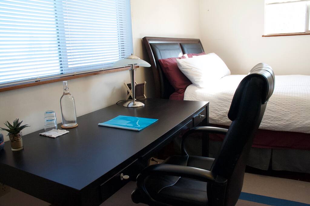 Study desk has two lockable drawers and a pull-out surface.