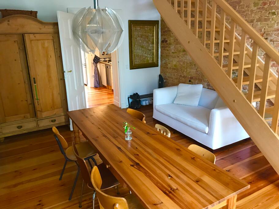 Dining room with big table and couch (3rd floor)