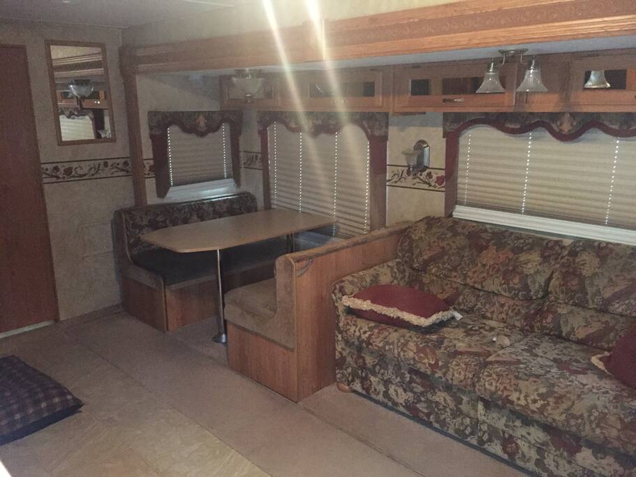 Couch and dinette can be beds