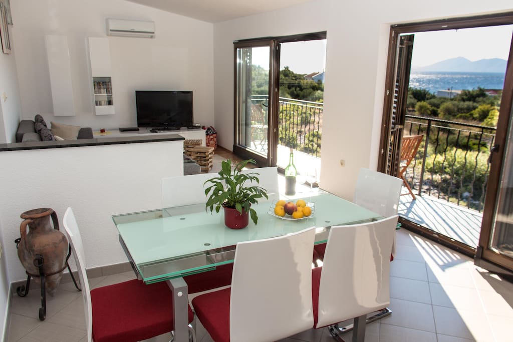 Wonderful open plan living area with panoramic sea views