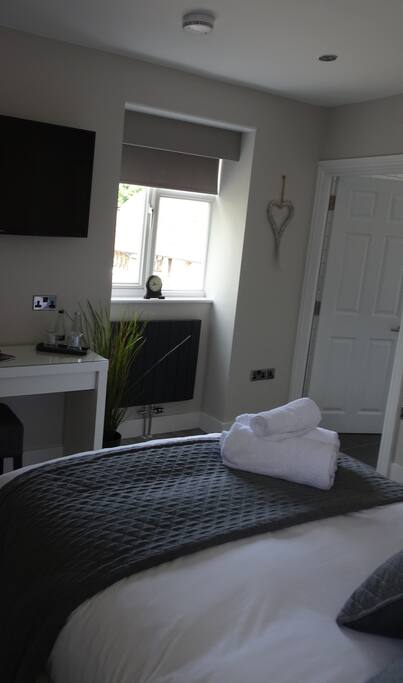 This large double room has a huge smart TV and is personally decorated to a high standard, allowing for a perfectly relaxed evening in.
