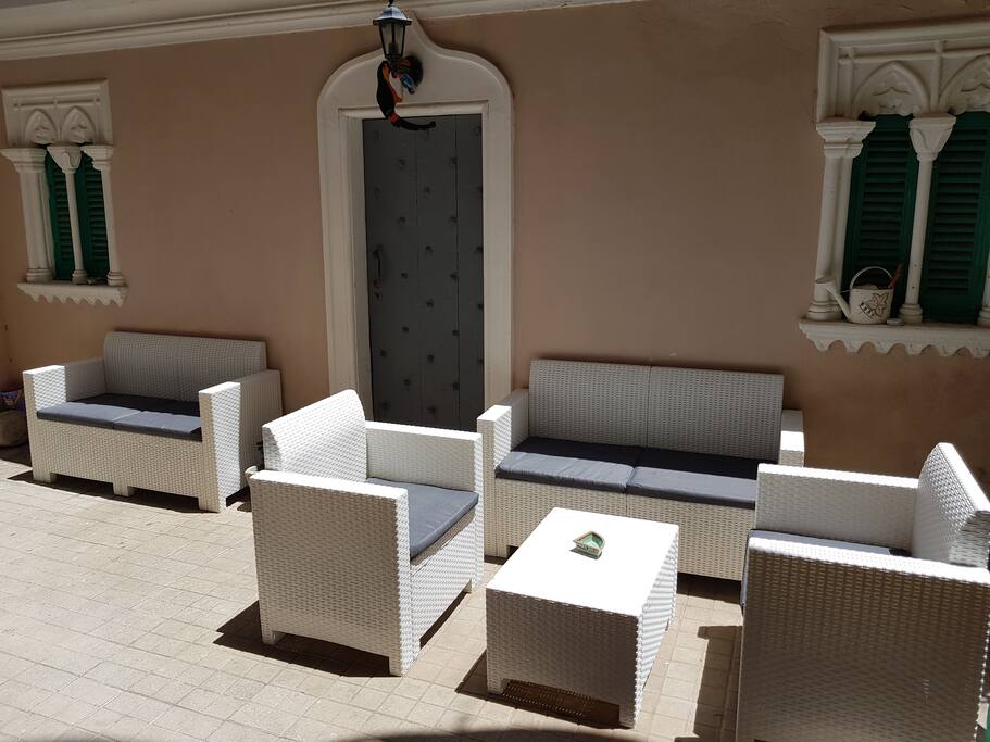 Terrace and door to the storage where there is the washing machine.