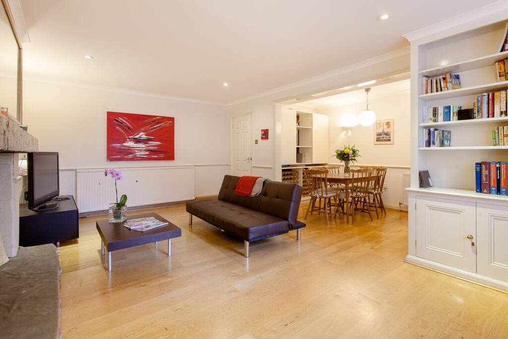 Large living room with sofa bed