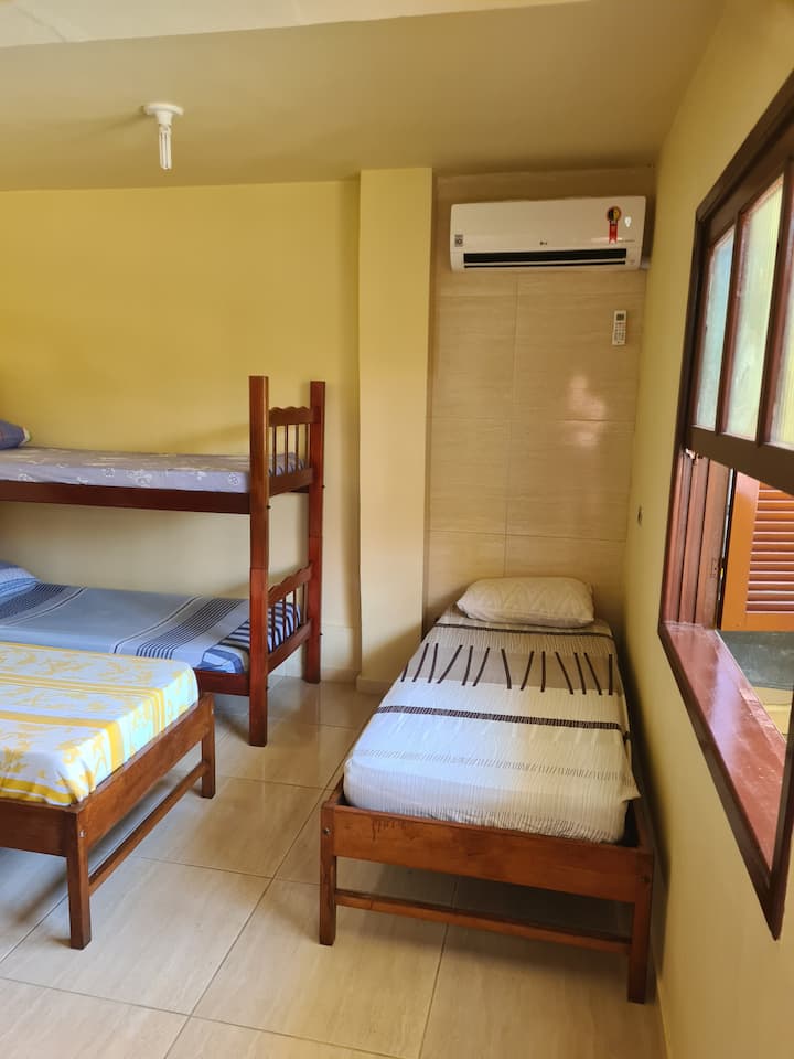 Quarto 1 com Ar Condicionado
