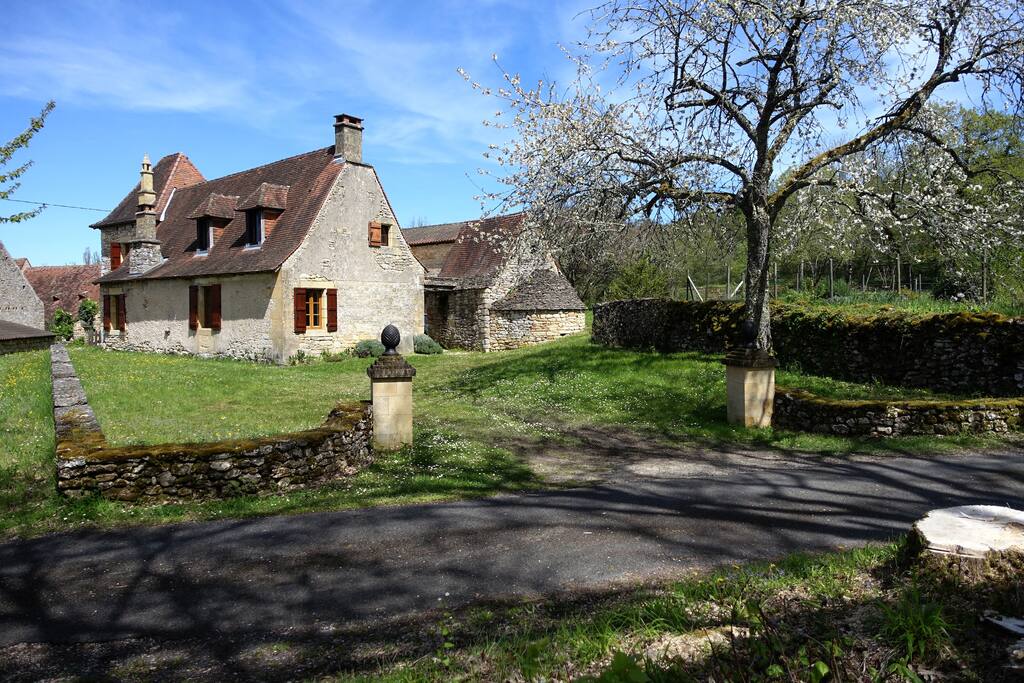 Old house from the XVIIth century in a typical hamlet, surrounded by fields and forests