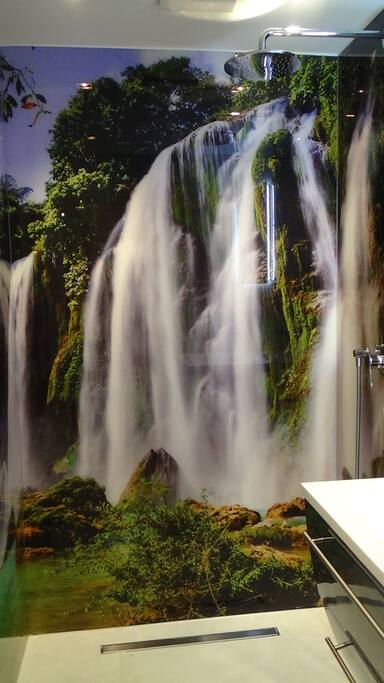 Shower under the waterfall