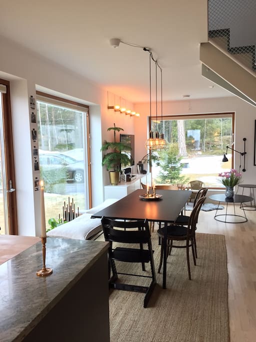 Kitchen, dinner table and living room on the first floor.