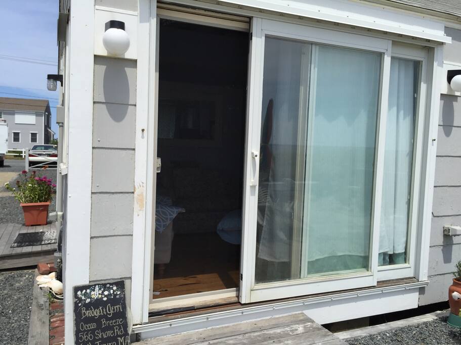 our slider opens onto patio which leads to private beach