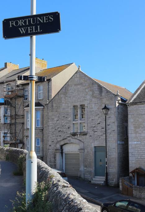 Front of the house on the steep Queens Road where there is free parking