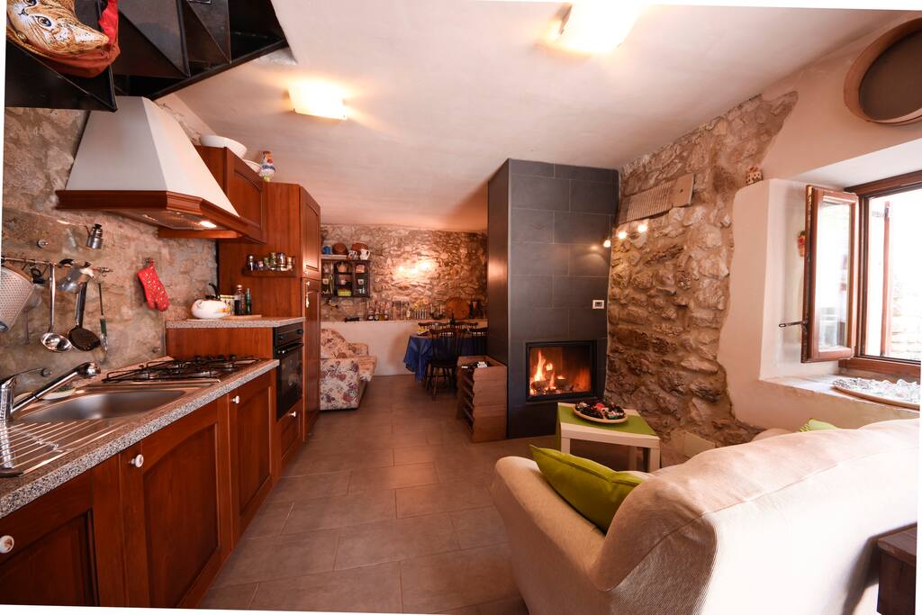 Ground Level - Living Room in front of fireplace/Piano Terra
