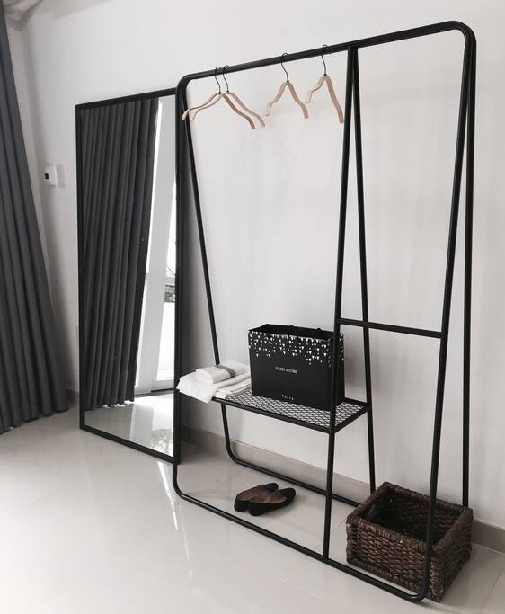 Bedroom 01 modern hanging cloth rack and large mirror