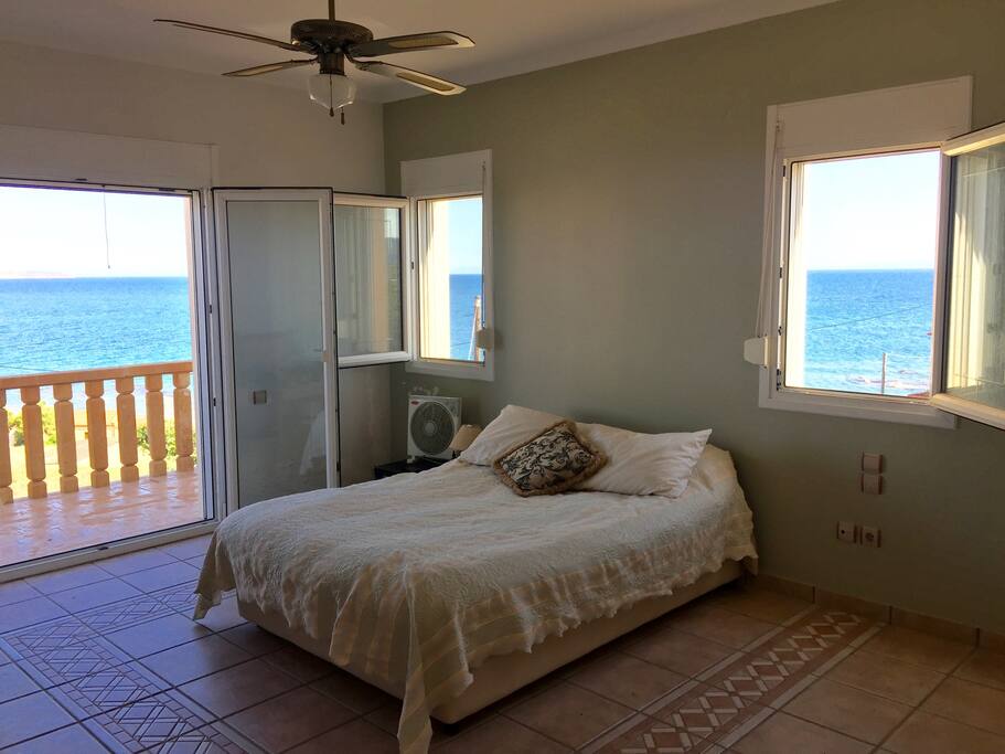 Master Bed w/ Private Bath and balcony