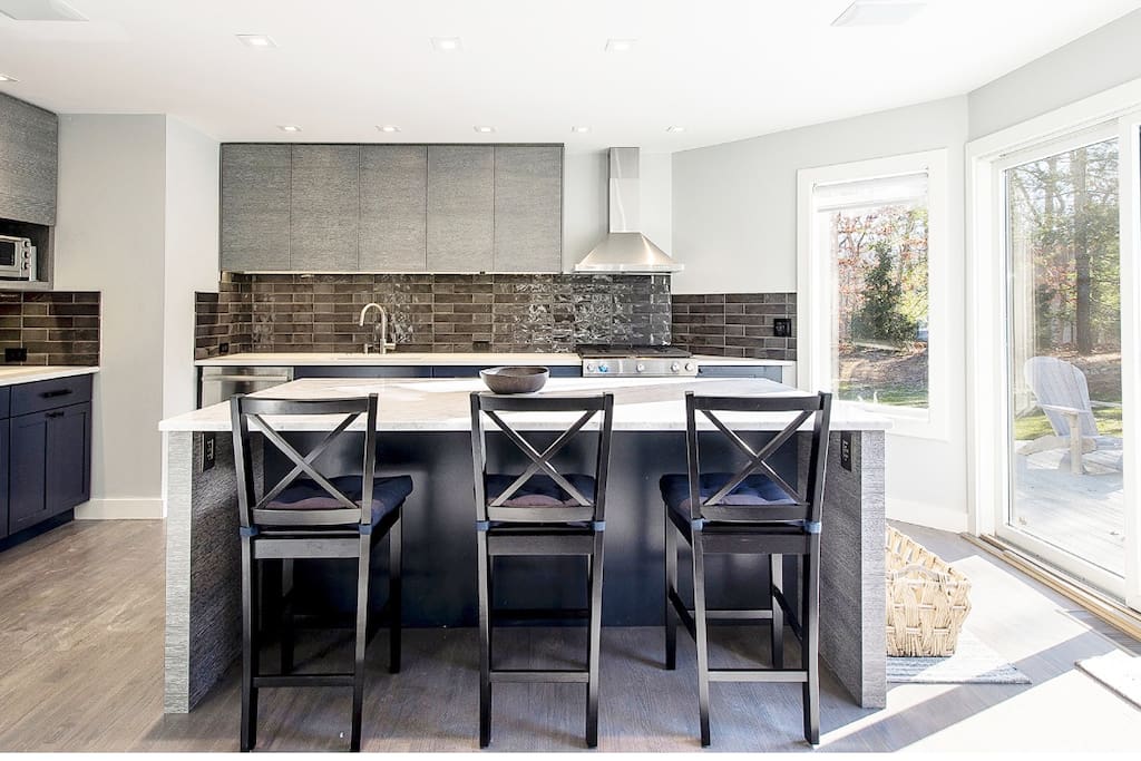 Brand new kitchen with gas stove and subzero fridge