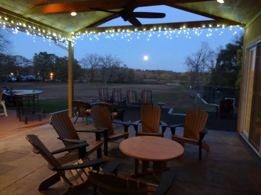 Multiple outdoor firepit areas with plenty of Adirondack seating
