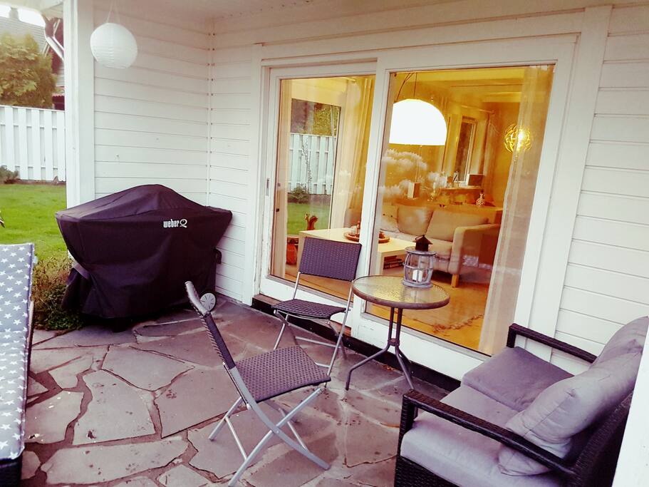 Our terrace, and grill. Lightet at evening. Sun from ten til ten.