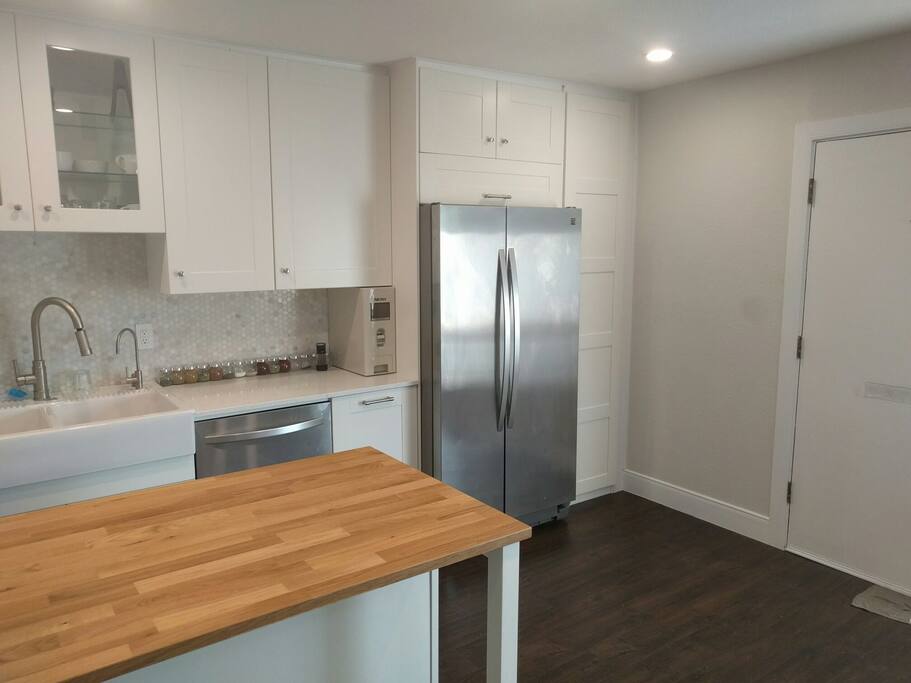 spices, dishwasher, fridge. plenty of storage space