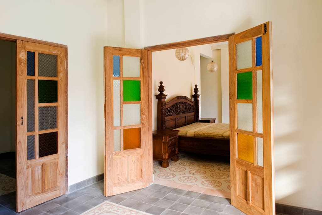 Nice coloured glass door to the master bedroom