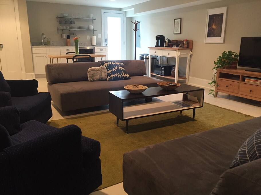 Living area with flat-screen TV (with cable and sports package).