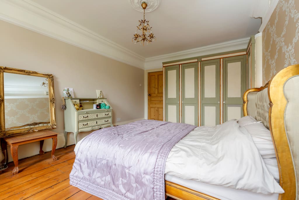 Bedroom with lots of storage, including masses of wardrobes