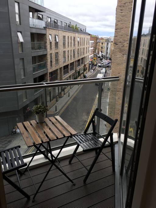 Balcony overlooking brick lane