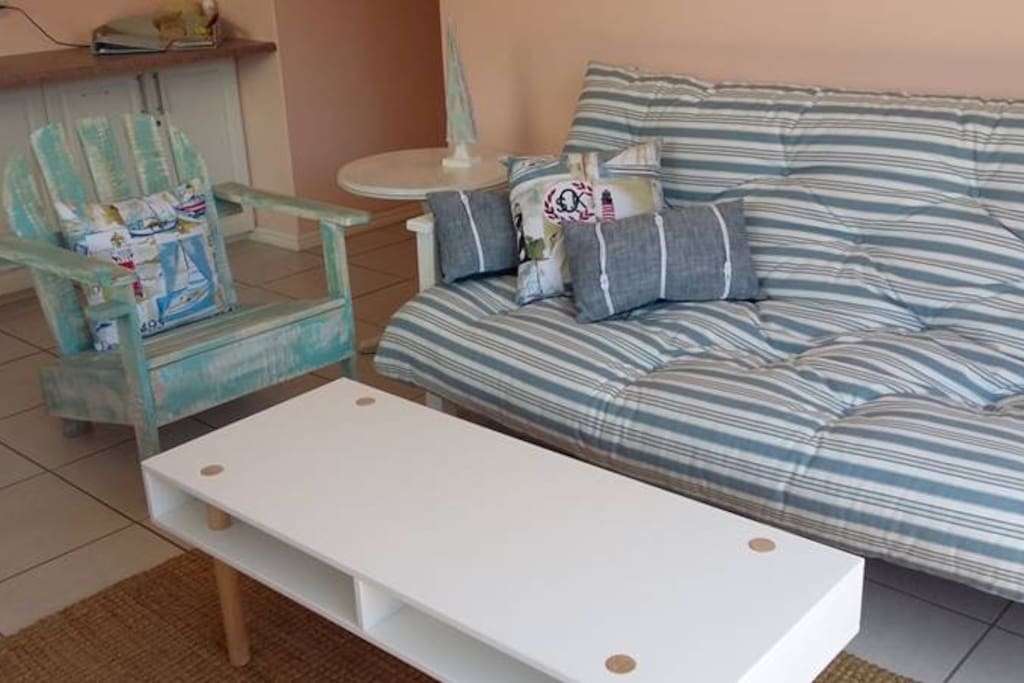 Open plan lounge with sleeper couch