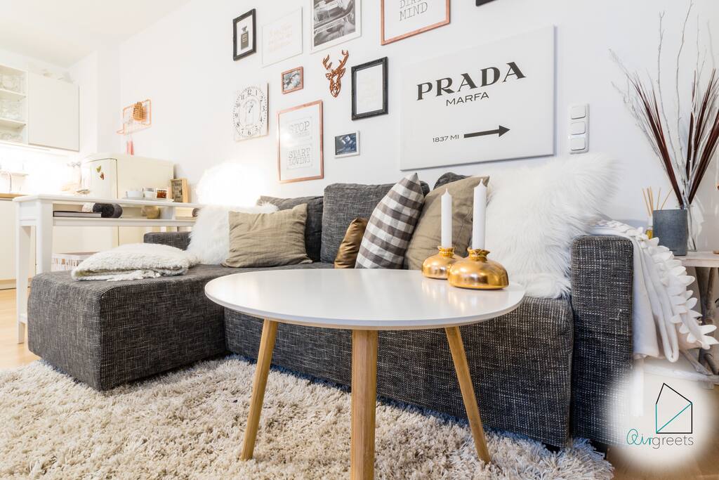 The apartment is decorated with beautiful items.