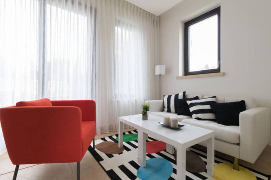 Cozy living room with loads of sun shine!