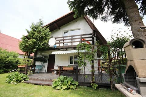 Successful Airbnb property: Sunny cottage by the sea in Gmina Ustka