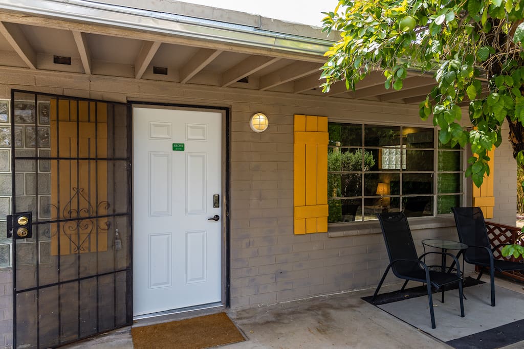Jerome entry door and private covered patio with table and chairs to enjoy the outdoor space!