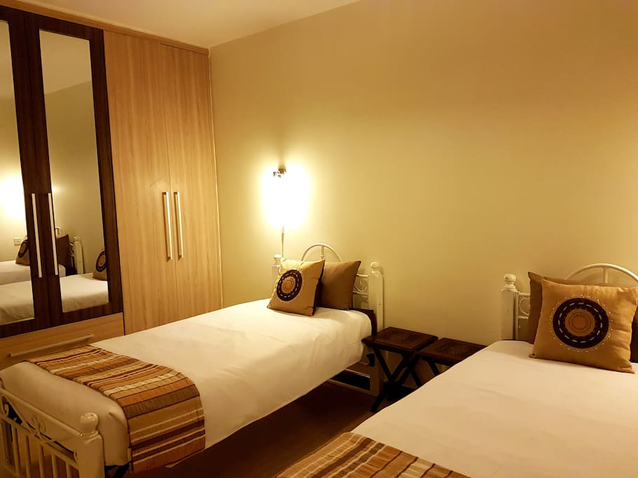Plenty of storage space for both guests sharing this room.