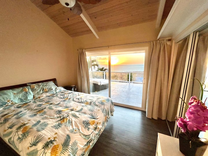 King bedroom upstairs - ocean views and upper floor lanai access