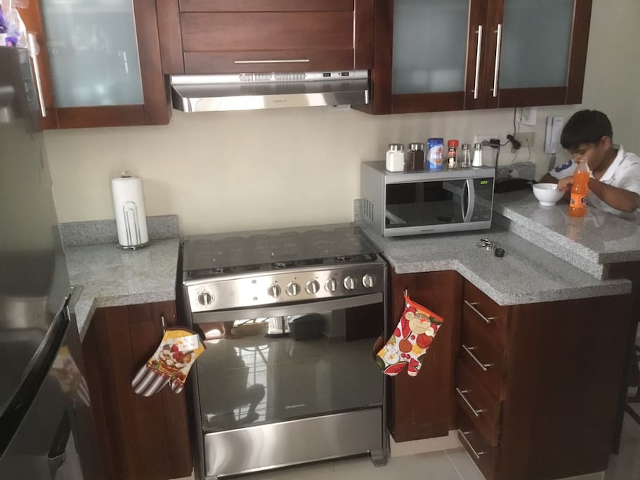 Stove (includes oven) , Microwave ..