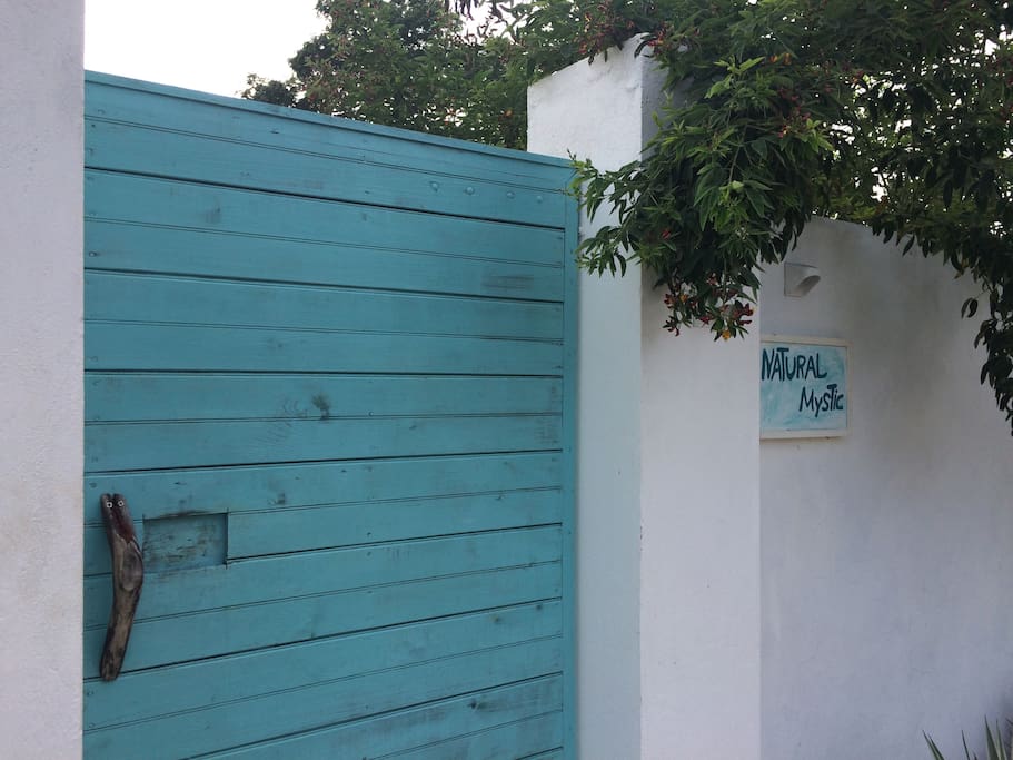 Behind the gate is Mystic Villa, sleeping 6, and Mystic Cottage, sleeping 2.