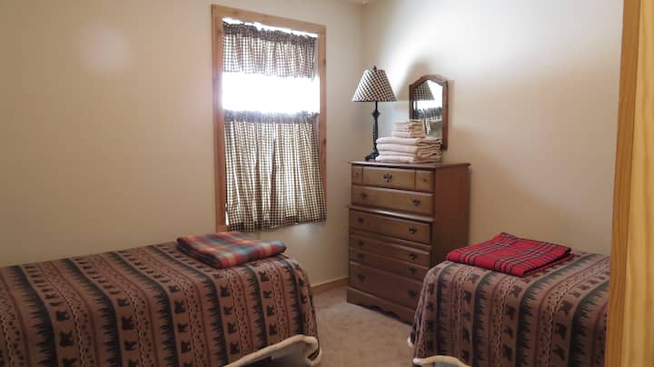 We call this the "bear" room because of the bears on the bed spreads!  We also supply wool blankets for your use and extra pillows in each room!