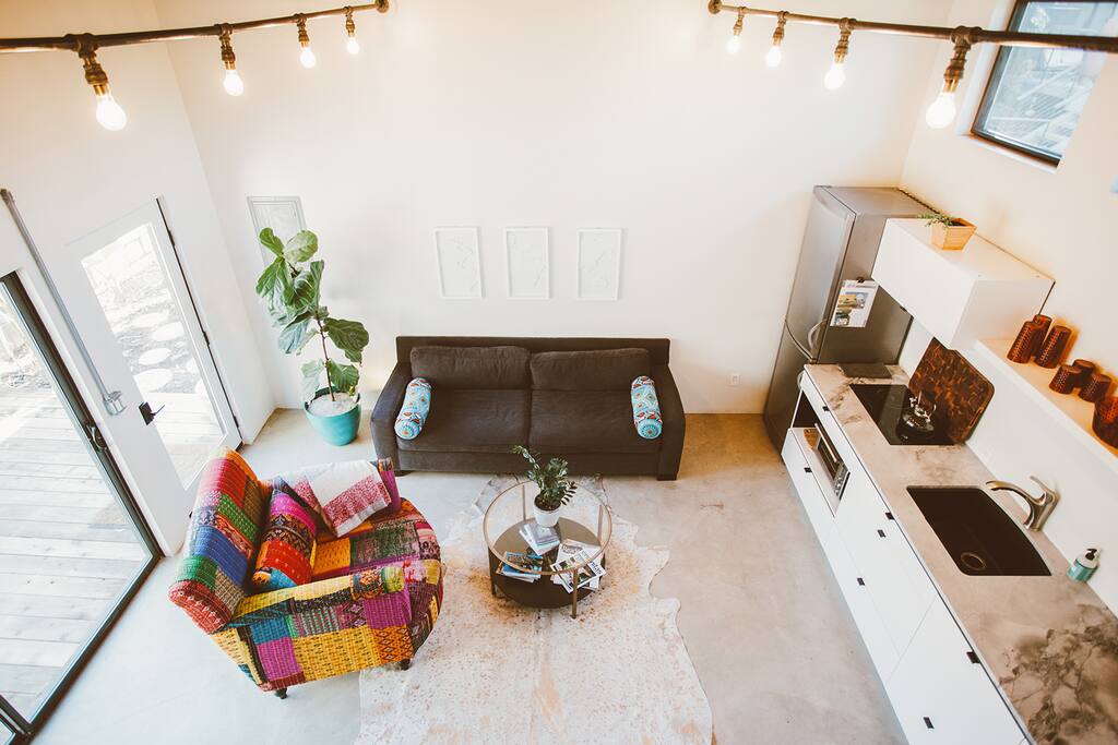 Great room with tons of light and high ceilings.