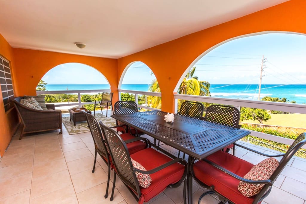 Outdoor living and dining room with 180-degree views of the turquoise sea!