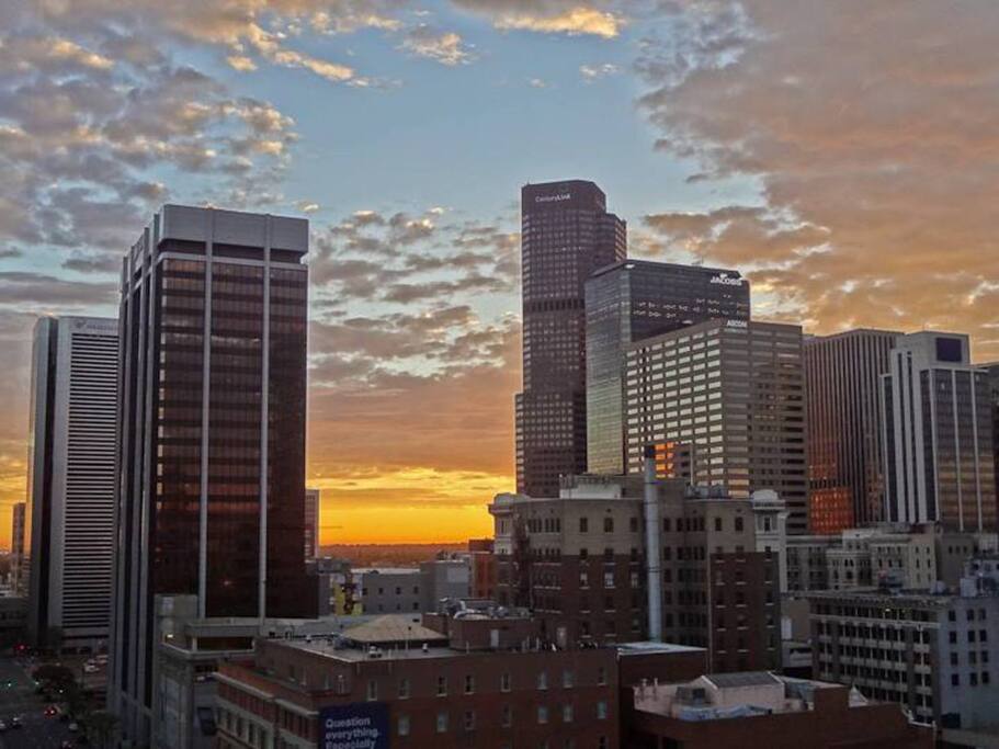 The sunset with the city view in the foreground