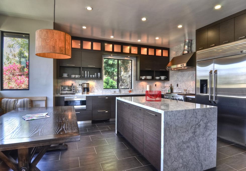 Modern kitchen and breakfast nook is a cook's dream!