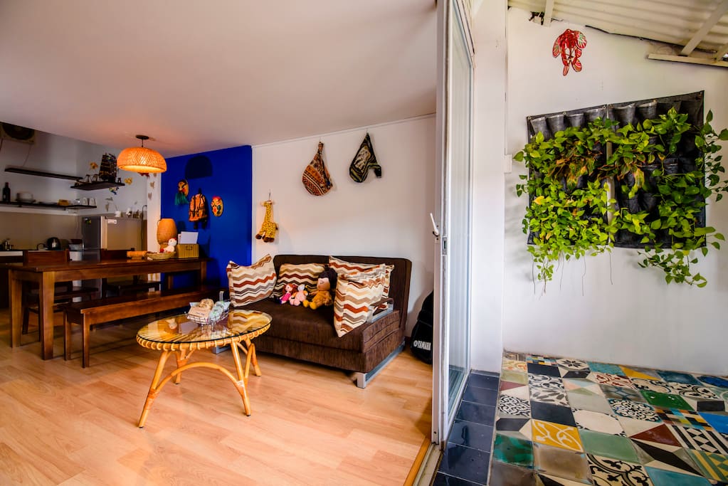 A cozy apartment with spacious balcony. We put some green trees to create a touch to the nature.