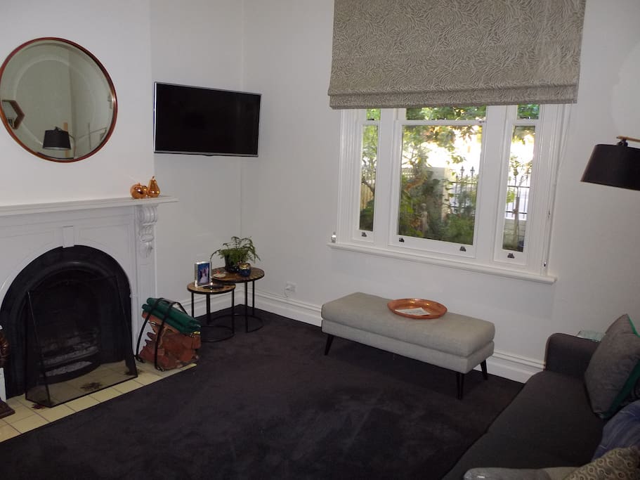 Guests private sitting room/tv/fireplace