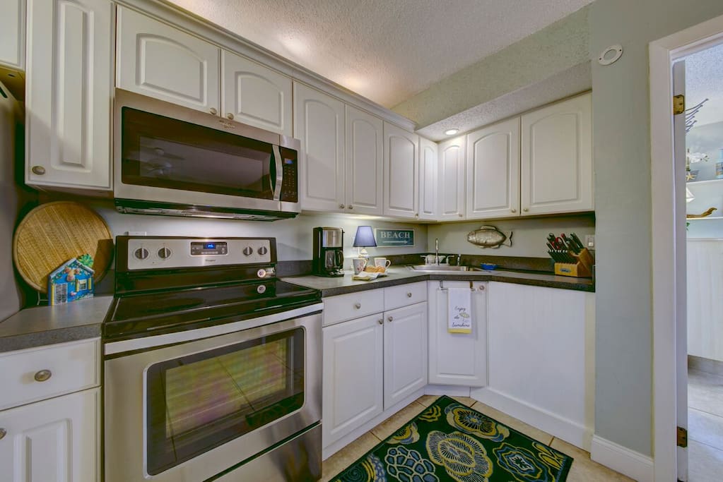 Full kitchen with all the utensils needed to cook.